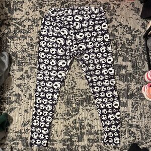 LuLaRoe Women’s dark purple and Jack Skelligan Leggings